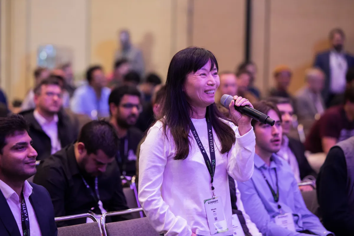 Founders and investors networking at the TechCrunch Disrupt conference in San Francisco